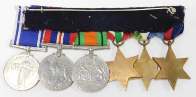 A WWI pair and WWII group with police interest, comprising 1914-18 British War medal and Victory medal inscribed to 240497 Sgt H Swinn Lincolnshire Regiment, and WWII medal group for his son PC George Swinn ex Royal Navy, Boston Borough Police and Lincoln - 7