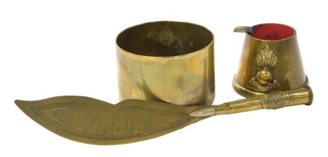 WWI trench art, including an artillery brass shell case ashtray, shell case brass bowl and bullet handled brass letter opener with Army Service Corps crest and the blade inscribed Arras and Corbi.