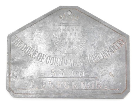 A 19thC pewter identification plate for the Duke of Cornwall's Light Infantry, named to J Flecknor, number 5790, with crest, the reverse stamped Duty, and stamped name for Hobson and Son, Lexington Street, London, 8.5cm x 11.5cm.