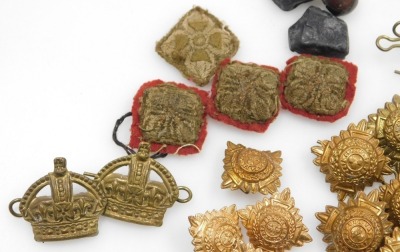 A collection of military brass shoulder rank and other insignia. - 3