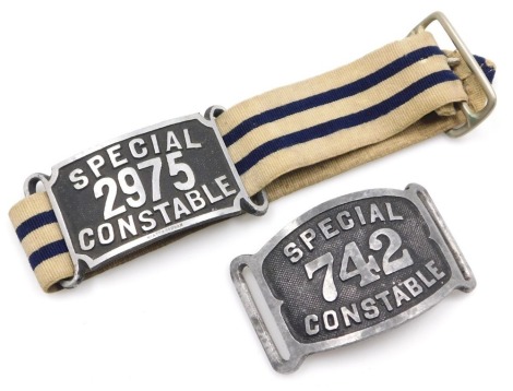 Two Police Special Constabulary alloy armband plates, one inscribed Special Constable 2975, by Hiatt & Co, Birmingham, the other inscribed Special Constable 742.