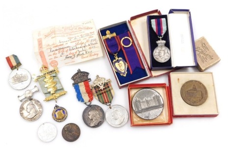 A collection of Victorian and later commemorative medallions and medals, some with original boxes.