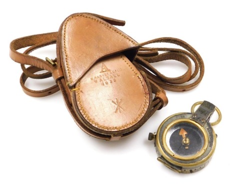 A WWI military brass compass, Verner's pattern, by Short & Mason Limited London, number 16202, 1916, in later leather case stamped M Harvey & Co Walsall 1938, with strap.