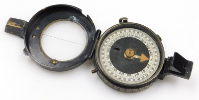 A WWI military brass compass, in leather case. - 2