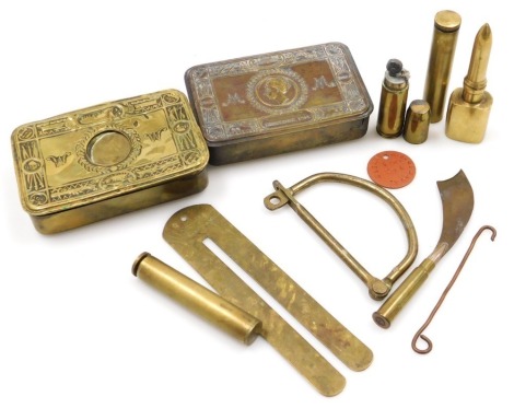 Two WWI Princess Mary brass gift tins, Christmas 1914 (both AF), a Player Bros brass button stick, ID (dog tag) for Second Lieutenant HS Gibson, Yorkshire and Lancashire Regiment, brass shell case lighter, kit bag lock, oil cans, etc.