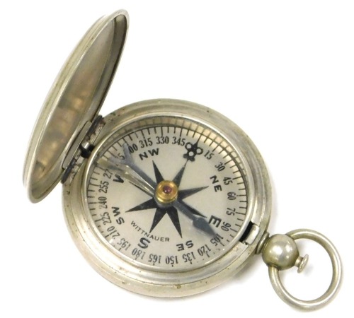 A United States Army standard issue compass, in white metal case, by Wittnauer.