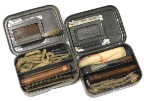 Two British Army rifle cleaning kits, in original tin boxes.