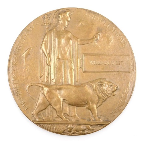 A WWI bronze death plaque, named to William West.