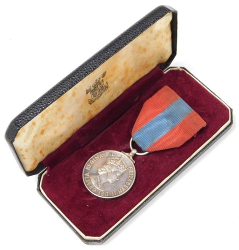 A Queen Elizabeth II Imperial Service medal, inscribed to Thomas Wilson Cooper, cased.