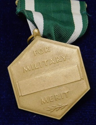 A US Navy Military Commendation medal, etc., including a Queen Elizabeth South Atlantic medal replica, British Red Cross Society Service medal, and a replica Military Cross. - 3