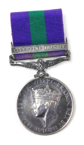 A George VI General Service medal, with Palestine 1945-48 clasp, inscribed to 14135180 Signalman R Hutton R Sigs.