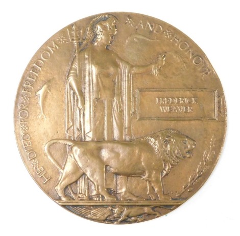 A WWI bronze death plaque, named to Frederick Weaver.