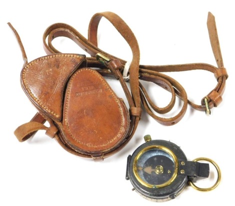 A WWI brass compass by CH Kemp Limited, Verner's pattern, number 101261, circa 1918, in leather case stamped D Stocks 1918 Edinburgh.