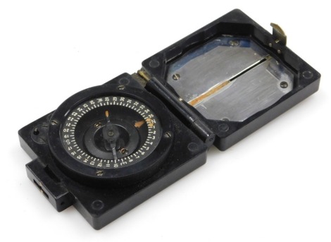 A WWII period British Army marching compass, by TG Co Limited, mark 1, number B16412, in square black Bakelite case.