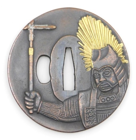 A Japanese copper katana tsuba, decorated with the bust of a warrior, highlighted in gilt, and a with pagoda decoration to the reverse, 7.55cm diameter.