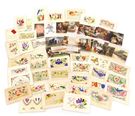 A collection of WWI silk postcards, mainly general greetings cards and Christmas, also Yorkshire Light Infantry Greetings from India, and Lord Kitchener with allies flags and other WWI period postcards. (approx 50)