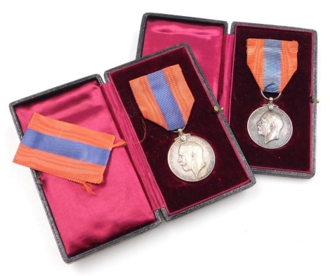 Two George V Imperial Service Medals, issued to William Hutson and William Mitchell, both cased.