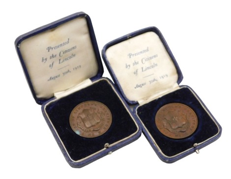 Two Lincoln Appreciation bronze medallions 1914-19, inscribed In Token of Lincoln's Gratitude, both cased.