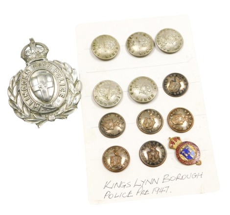 A Lincoln City Police helmet badge and King's Lynn police buttons, also King's Lynn Police enamelled Special Constable lapel badge.