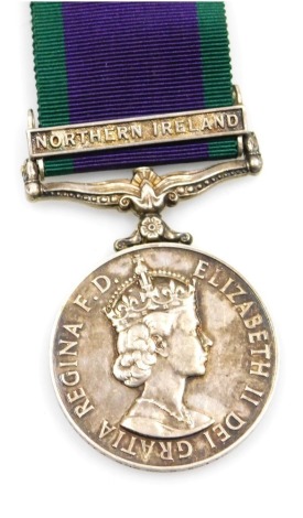 An Elizabeth II General Service medal with Northern Ireland clasp, inscribed to 24326774 Gnr MG Smith, Royal Artillery.