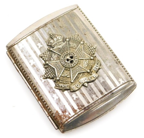 A Border Regiment steel cigarette case, with regimental crest.