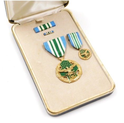 A United States Joint Service Commendation Medal, with miniature version and ribbon bar, cased.