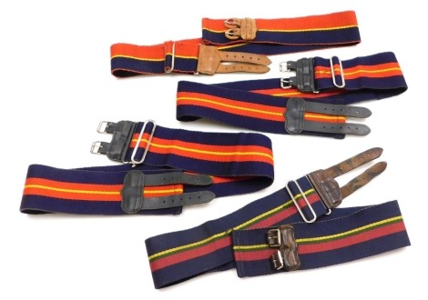 Four military stable belts, including two for the Royal Anglian Regiment by Hobson & Sons (London).