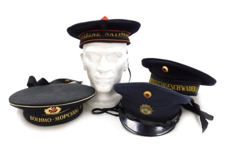 German, Russian and French military headdress, in the form of a German dress cap by Albert Kempfk, 1963, and a German Naval cap by Gebrúder Klotz, circa 1959, a post war Russian naval hat, and a French Marine Nationale Naval cap. (4)