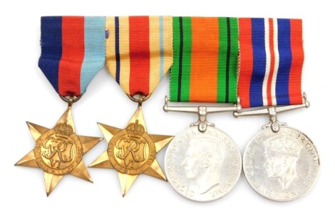 A WWII medal group, comprising 1939-45 British War medal, the 1939-45 Star, the Africa Star and Defence medal.