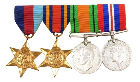 A WWII medal group, comprising 1939-45 War medal, the 1939-45 Star, the Burma Star and Defence medal.