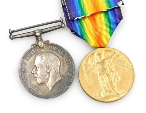 A WWI medal pair, comprising 1914-18 British War medal (lacking ribbon) and Victory medal, inscribed to 54II Pte C Bingham Lincolnshire Regiment.