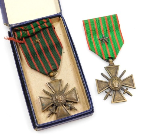 Two French WW1 Croix de Guerre medals, both 1914-18, each with a star to the ribbon and one with original box.