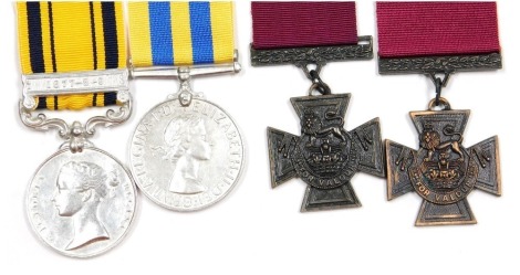 Four replica medals, comprising two Victoria Crosses, a Victoria South Africa medal with 1877-8-9 clasp, and a Queen Elizabeth Korea medal.