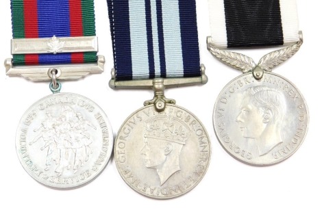 A George VI New Zealand War Service medal 1939-45, etc., including a 1939-45 India Service medal, and a Canadian Volunteer Service medal 1939-1945, with maple leaf clasp. (3)