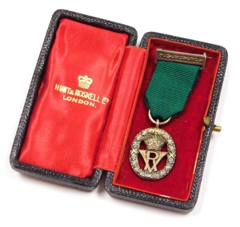 A Victoria Volunteer Officer's Decoration miniature, in gilt lined Morocco leather case for Hunt & Roskell Limited, London.