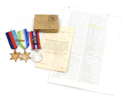 A WWII medal group, comprising 1939-45 British War medal, The Atlantic Star and the 1939-45 Star with France and Germany clasp, the British War medal with oak leaf (MID) insignia, as awarded to George Henry Burrell RNR, and with later facsimile and printe