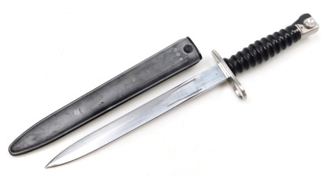 A Swiss Army M57 bayonet, by Waffen Fabrik, with maker's stamp and number W95104, blade 23cm long, with scabbard.