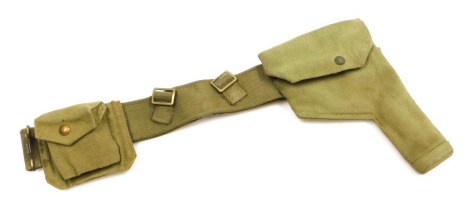 A WWII British Army canvas webbing belt with .38 calibre revolver holster, and ammunition pouch, the holster marked ME Co 1938 with broad arrow insignia and the ammunition pouch ME Co 1941 with broad arrow.