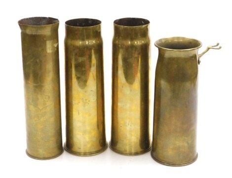 A WWI and WWII brass ordnance shells, one with trench art engraving initialled BS, two further WWI 13 Pdr shell cases, and a circa 1942 25 Pdr shell case now as a poker stand. (4)