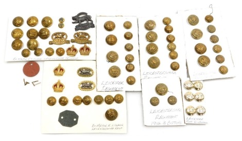 A collection of Leicestershire Regiment buttons and cap badges, and rank insignia, some reputedly relating to Ex Major RS Clarke. (1 tray)