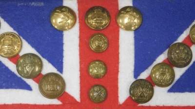 Various British Army regimental brass buttons, mounted on Union Jack felt flag backing, framed and glazed. - 4