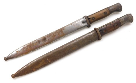 Two German K98 mauser bayonets, with 14.5cm blades, one blade stamped 43asw and 5219 to the reverse, the other with maker's mark for Gottlieb Hammersfahr, Solingen Foche, both with steel scabbards, the first bayonet with steel scabbard 44ASW.