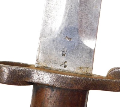 A British Army 1903 pattern SMLE bayonet by Wilkinson, the 29cm double edge blade stamped Wilkinson London to the ricasso and ER with a crown, with leather sheath stamped Wilkinson also 35W, and another British Army sword bayonet by Wilkinson of London, w - 5