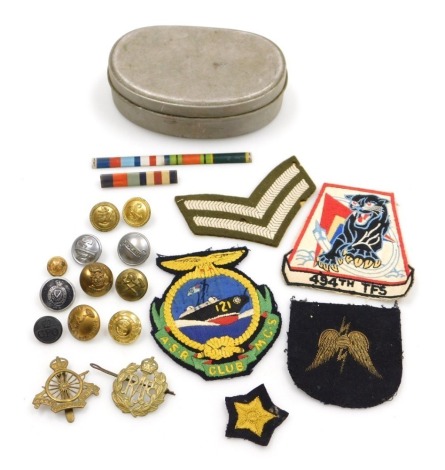 Military cap badges and buttons, including Army Cyclist Corps and RAF, Royal Marines, Royal Ulster Constabulary, GPO, fire service, cloth badges including 494th Fighter Squadron, a small quantity in aluminium tin.