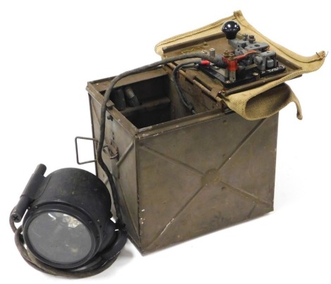 A WWII British Army morse code and lamp signalling set, in original steel case with canvas cover.