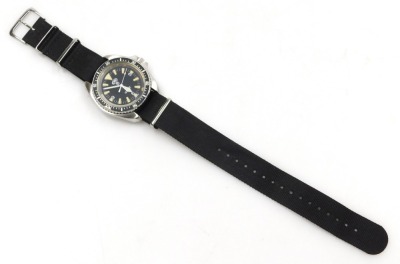 A CWC British Military quartz divers watch, stainless steel case, with black dial and bezel, luminous baton markers, the back of the case marked 0555/6645-997573314, with broad arrow over 108/97, with black woven military strap. - 2