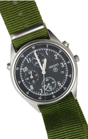 A Seiko British military chronograph watch, in stainless steel case with black dial, three subsidiary hands and date, with luminous Arabic numerals and hands, the case back numbered 6645-99 8149181 with broad arrow above 1187/93, serial number 696309, and