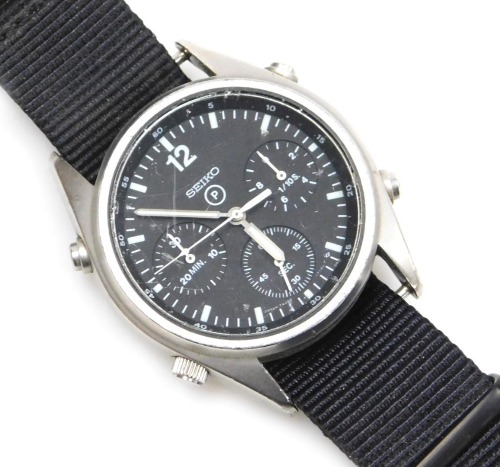 A Seiko British military chronograph watch, in stainless steel case with black dial, three subsidiary hands and date, with luminous Arabic numeral, markers and hands, the case back numbered 6645-99 1683056 with broad arrow above 2878/84, serial number 482