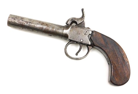 A 19thC boxlock percussion pistol, with plain walnut grip, 17cm long overall.