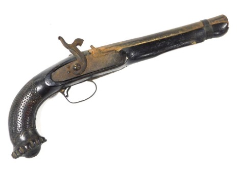 A 19thC Continental percussion pistol, probably converted, the barrel with indistinct engraved marks, with carved chequer grip and terminal with brass pommel, 34cm long.